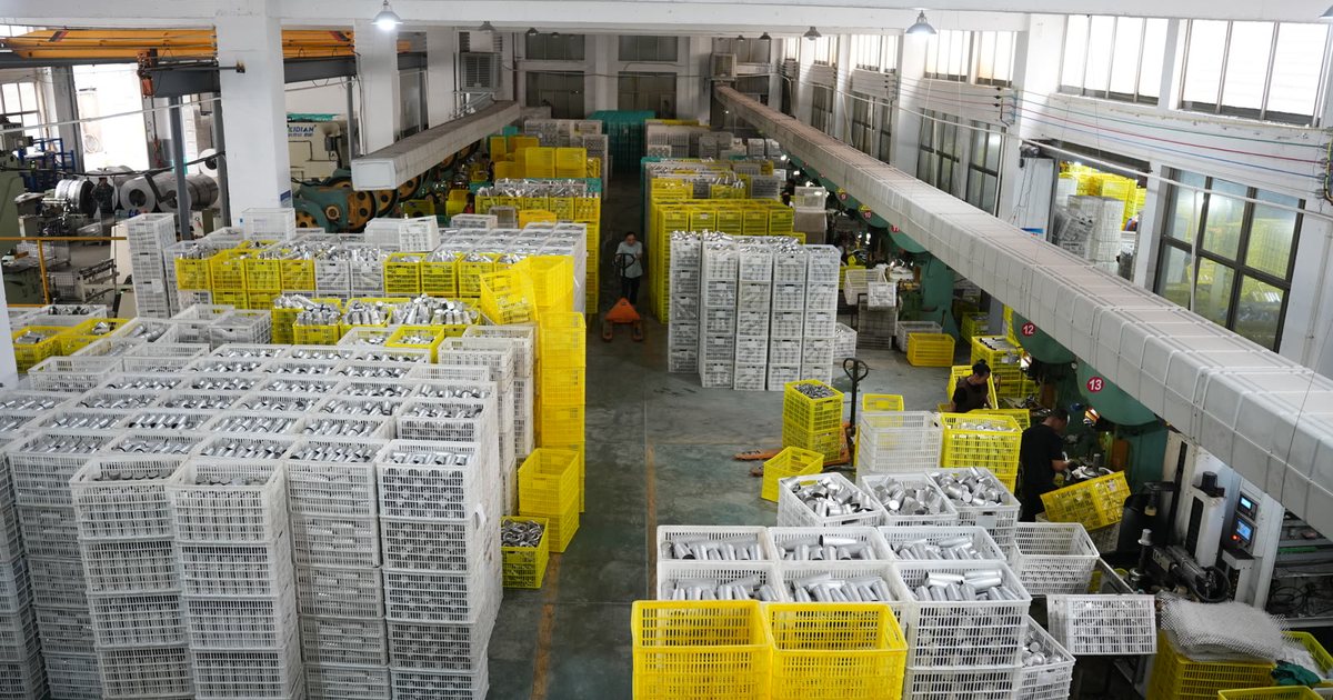 Yongkang tumbler factory warehouse stacked with crates of stainless steel cup bodies waiting for coating and assembly ahead of the Chinese New Year shutdown